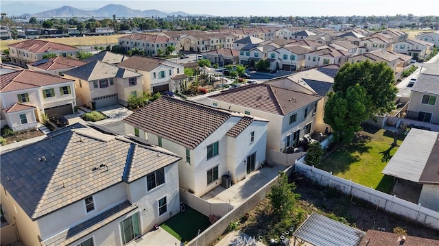 980 W Jasmine Way, Rialto, CA 92376 - aerial view of residential area with a mountain backdrop
