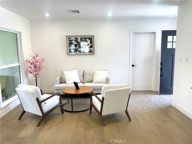16913 Covello St, Van Nuys, CA 91406 - living room with light wood-style floors and recessed lighting