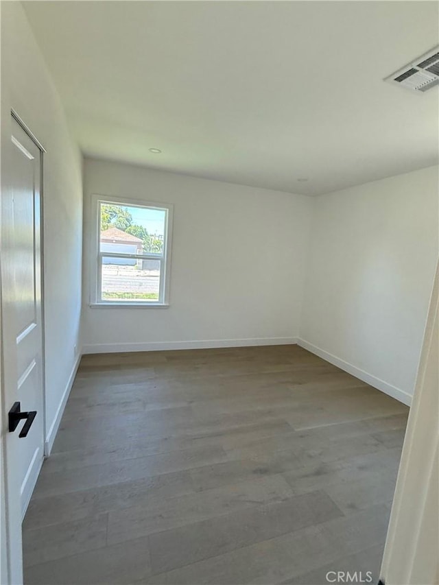 16913 Covello St, Van Nuys, CA 91406 - unfurnished room featuring baseboards and wood finished floors