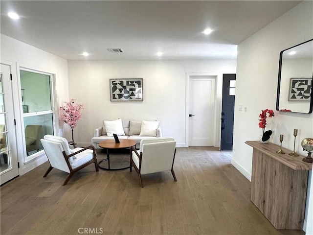 16913 Covello St, Van Nuys, CA 91406 - living area with hardwood / wood-style flooring and recessed lighting