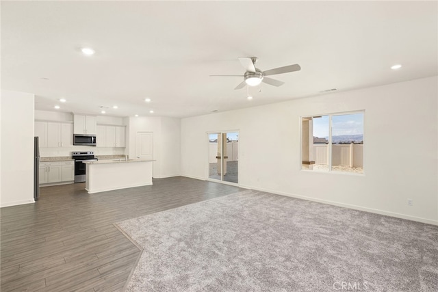 42499 Aruba Ct, Indio, CA 92201 - unfurnished living room featuring recessed lighting, a ceiling fan, baseboards, and wood finished floors