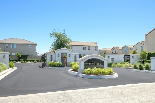 3611 Highclere Way, Clovis, CA 93619 - view of asphalt street featuring a residential view, curbs, and a gated entry