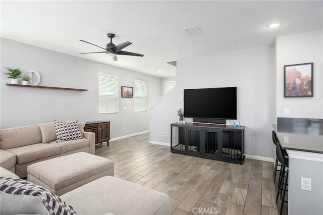 3611 Highclere Way, Clovis, CA 93619 - living area with ceiling fan, wood finished floors, baseboards, and recessed lighting