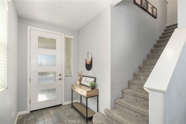 3611 Highclere Way, Clovis, CA 93619 - entryway with stairs, baseboards, and light wood-style floors