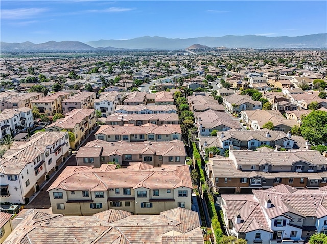 12473 Constellation St, Eastvale, CA 91752 - aerial perspective of suburban area featuring a mountainous background