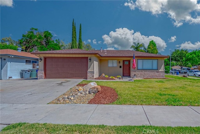 1615 Loughborough Dr, Merced, CA 95348 - single story home featuring a garage, concrete driveway, a front yard, and stucco siding