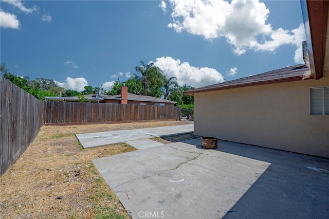 1615 Loughborough Dr, Merced, CA 95348 - fenced backyard featuring a patio area