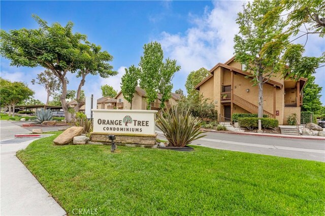 105 Tangelo Unit 400, Irvine, CA 92618 - community / neighborhood sign featuring a yard