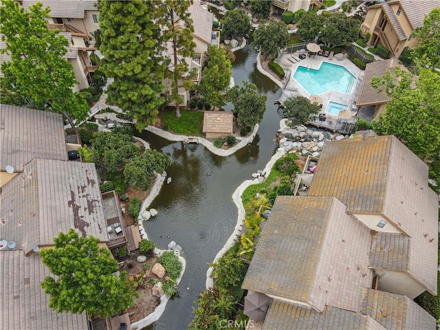 105 Tangelo Unit 400, Irvine, CA 92618 - aerial view of property's location with a pool area and nearby suburban area