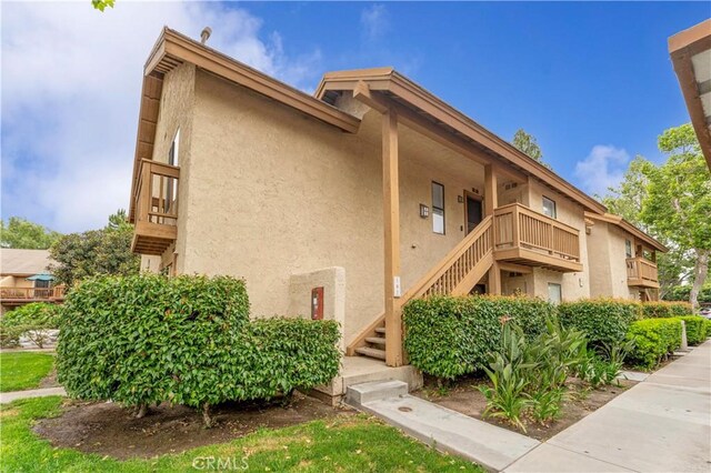 105 Tangelo Unit 400, Irvine, CA 92618 - view of building exterior featuring stairs