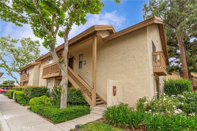 105 Tangelo Unit 400, Irvine, CA 92618 - view of building exterior featuring stairway