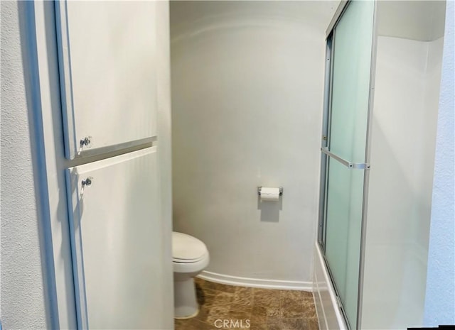 6815 Remmet Ave Unit 219, Canoga Park, CA 91303 - bathroom featuring a shower with door and tile patterned floors
