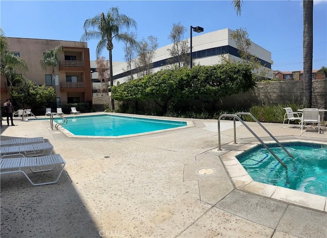 6815 Remmet Ave Unit 219, Canoga Park, CA 91303 - community pool featuring a patio area