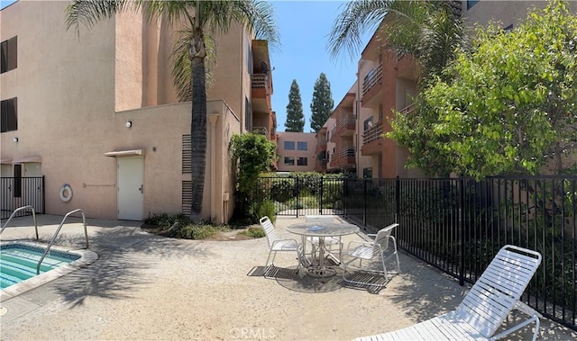 6815 Remmet Ave Unit 219, Canoga Park, CA 91303 - view of swimming pool with a patio and a swimming pool