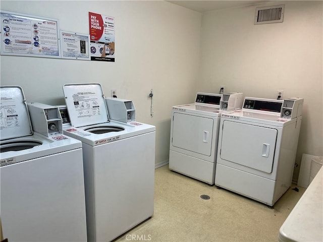 6815 Remmet Ave Unit 219, Canoga Park, CA 91303 - shared laundry room featuring washing machine and clothes dryer