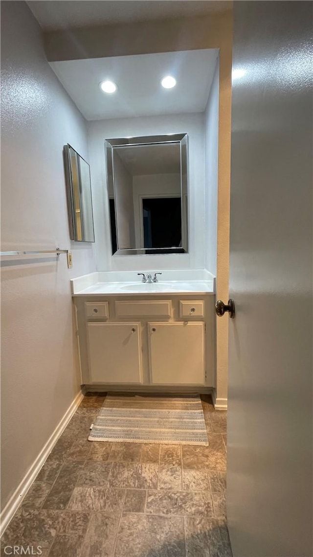 6815 Remmet Ave Unit 219, Canoga Park, CA 91303 - bathroom featuring vanity and recessed lighting