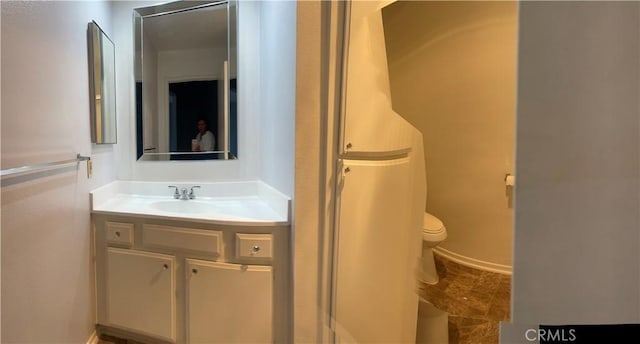 6815 Remmet Ave Unit 219, Canoga Park, CA 91303 - bathroom with vanity and toilet