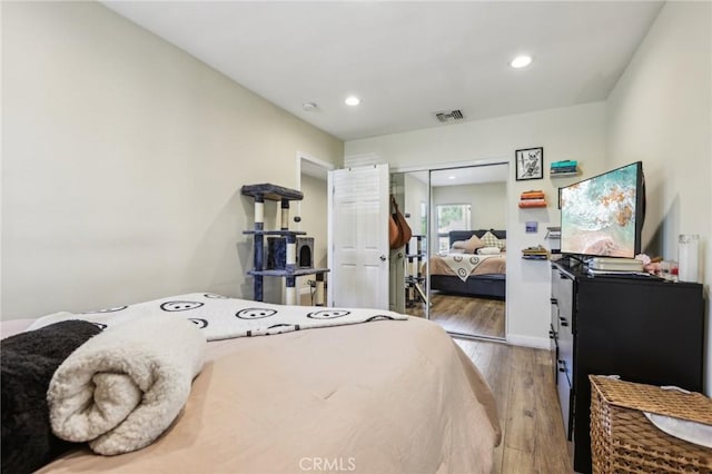 7117 Vanscoy Ave, North Hollywood, CA 91605 - bedroom with a closet, wood finished floors, recessed lighting, and baseboards