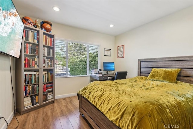 7117 Vanscoy Ave, North Hollywood, CA 91605 - bedroom featuring baseboards, wood finished floors, and recessed lighting