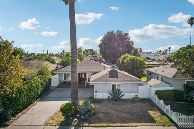 7117 Vanscoy Ave, North Hollywood, CA 91605 - view of front facade featuring a residential view and driveway