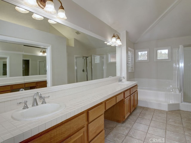 10655 Bruns Dr, Tustin, CA 92782 - full bathroom featuring vaulted ceiling, a shower stall, double vanity, a garden tub, and tile patterned floors