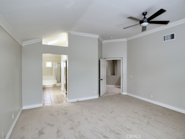 10655 Bruns Dr, Tustin, CA 92782 - empty room with crown molding, carpet flooring, a ceiling fan, and baseboards