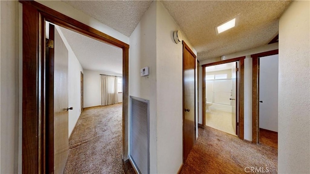 20061 Seneca Rd, Apple Valley, CA 92307 - hall with carpet floors and a textured ceiling
