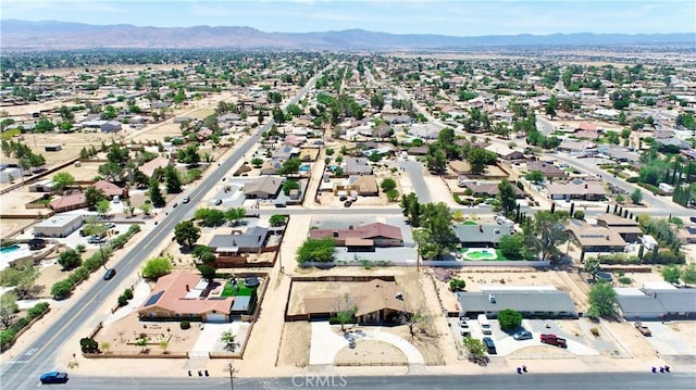 20061 Seneca Rd, Apple Valley, CA 92307 - aerial view of property's location with a mountain backdrop and nearby suburban area