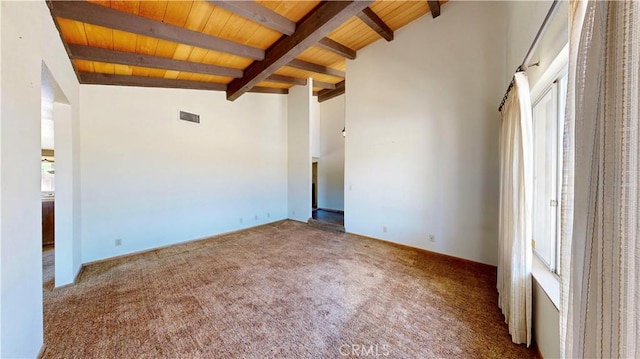 20061 Seneca Rd, Apple Valley, CA 92307 - carpeted spare room with wooden ceiling with exposed beams