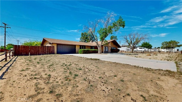 20061 Seneca Rd, Apple Valley, CA 92307 - ranch-style home with an attached garage and driveway