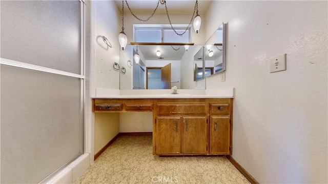 20061 Seneca Rd, Apple Valley, CA 92307 - full bathroom featuring vanity, a shower with shower door, and baseboards