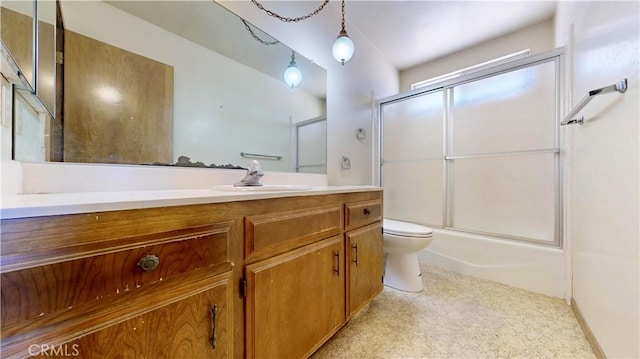 20061 Seneca Rd, Apple Valley, CA 92307 - full bath featuring toilet, vanity, and bath / shower combo with glass door