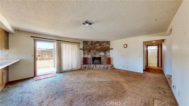 20061 Seneca Rd, Apple Valley, CA 92307 - unfurnished living room featuring carpet, a textured ceiling, a fireplace, and baseboards