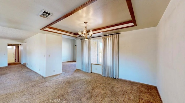 20061 Seneca Rd, Apple Valley, CA 92307 - unfurnished room with a tray ceiling, a chandelier, and carpet floors