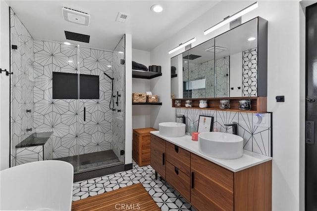 16302 Graystone Ave, Norwalk, CA 90650 - full bath with a stall shower, a soaking tub, double vanity, and recessed lighting