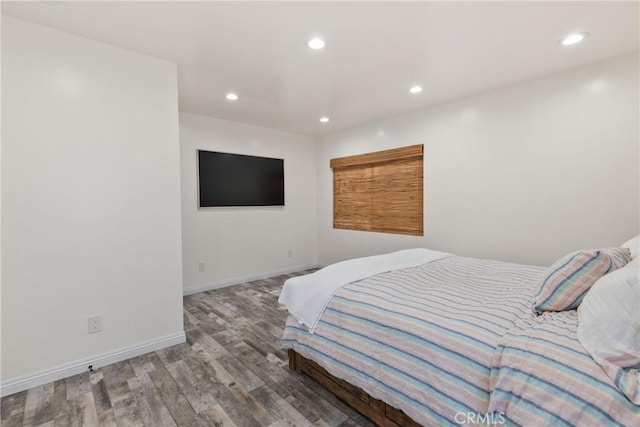 16302 Graystone Ave, Norwalk, CA 90650 - bedroom with wood finished floors, recessed lighting, and baseboards