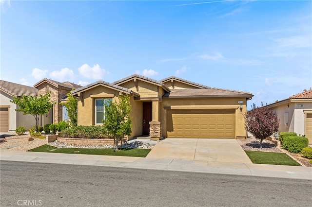 1536 Williamson, Beaumont, CA 92223 - view of front of property featuring a garage, stucco siding, concrete driveway, and a tile roof