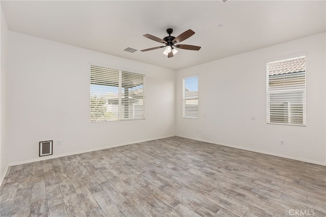 1536 Williamson, Beaumont, CA 92223 - spare room featuring light wood finished floors, ceiling fan, and baseboards
