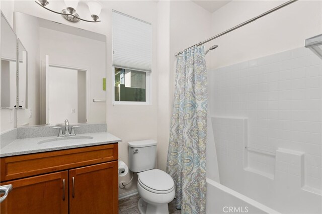 1536 Williamson, Beaumont, CA 92223 - full bathroom featuring vanity, toilet, and shower / tub combo with curtain