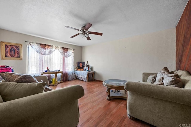 146 Padre Tullio Dr, San Ysidro, CA 92173 - living area with a ceiling fan, wood finished floors, and a textured ceiling