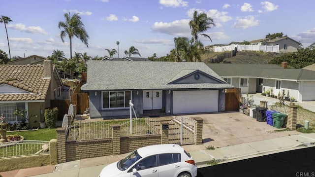 146 Padre Tullio Dr, San Ysidro, CA 92173 - ranch-style home featuring a fenced front yard, concrete driveway, a garage, a residential view, and a gate