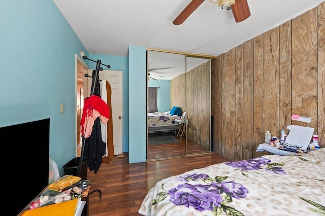 146 Padre Tullio Dr, San Ysidro, CA 92173 - bedroom featuring wood walls, a closet, wood finished floors, and ceiling fan