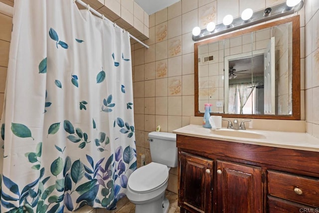 146 Padre Tullio Dr, San Ysidro, CA 92173 - full bathroom featuring tile walls, toilet, vanity, and a shower with curtain
