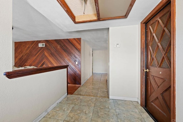 146 Padre Tullio Dr, San Ysidro, CA 92173 - hallway featuring wooden walls and baseboards