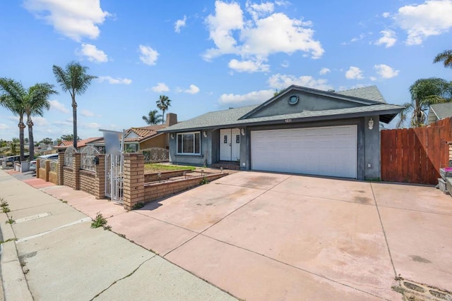 146 Padre Tullio Dr, San Ysidro, CA 92173 - ranch-style house with a garage, concrete driveway, and stucco siding