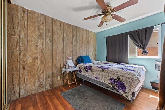 146 Padre Tullio Dr, San Ysidro, CA 92173 - bedroom with wood walls, wood finished floors, and a ceiling fan