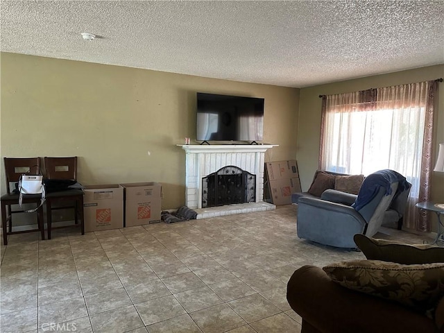 211 N Fillmore Ave, Rialto, CA 92376 - living area featuring a textured ceiling, a fireplace, and tile patterned flooring