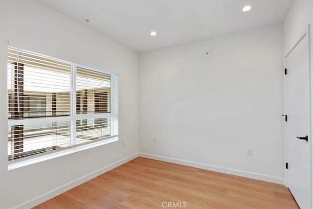 321 S Oxford Ave Unit 606, Los Angeles, CA 90020 - empty room with light wood-type flooring, baseboards, and recessed lighting