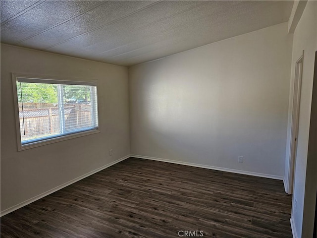2890 7th St, Clearlake, CA 95422 - empty room featuring dark wood-style flooring and baseboards