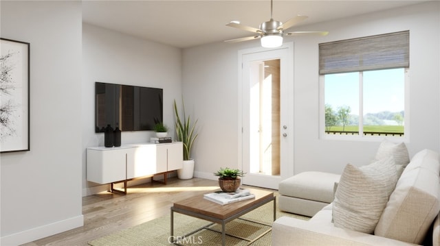 10002 Central Ave, Garden Grove, CA 92843 - living area with wood finished floors, baseboards, and a ceiling fan